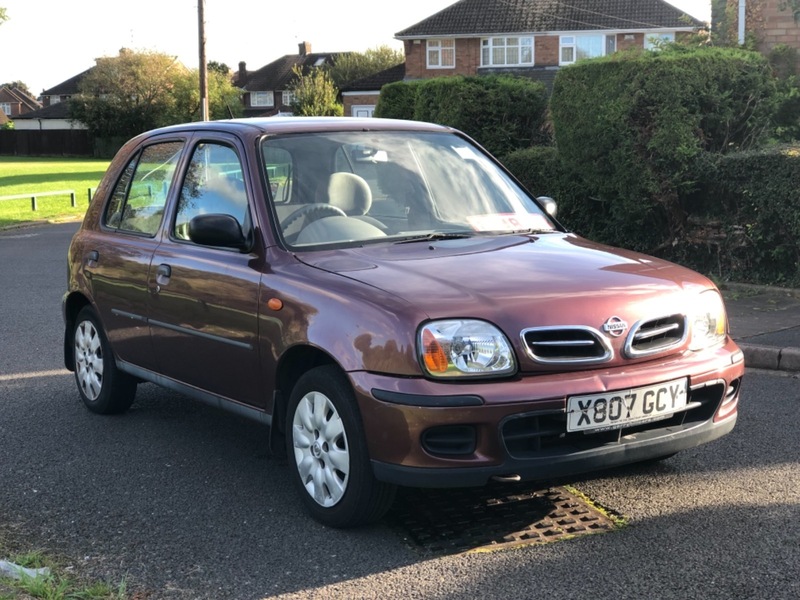 maroon nissan micra